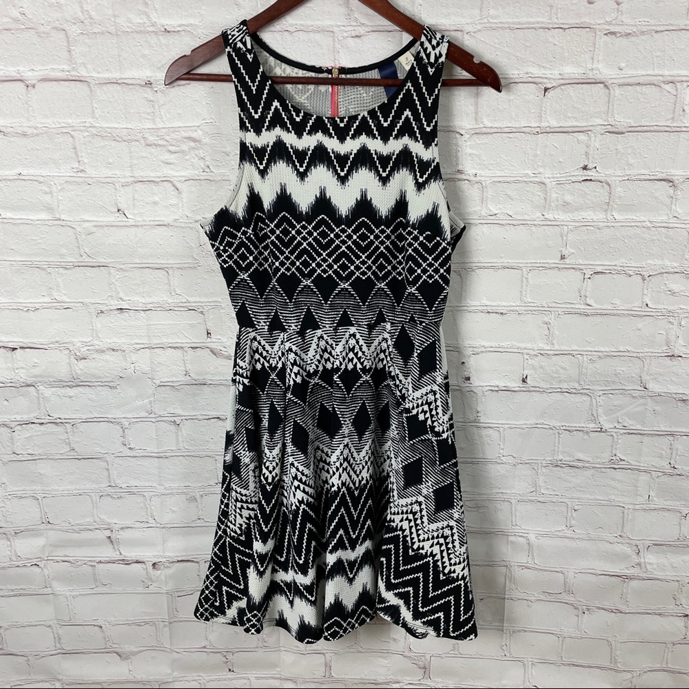 Black and white mini dress with neon pink chunky zipper